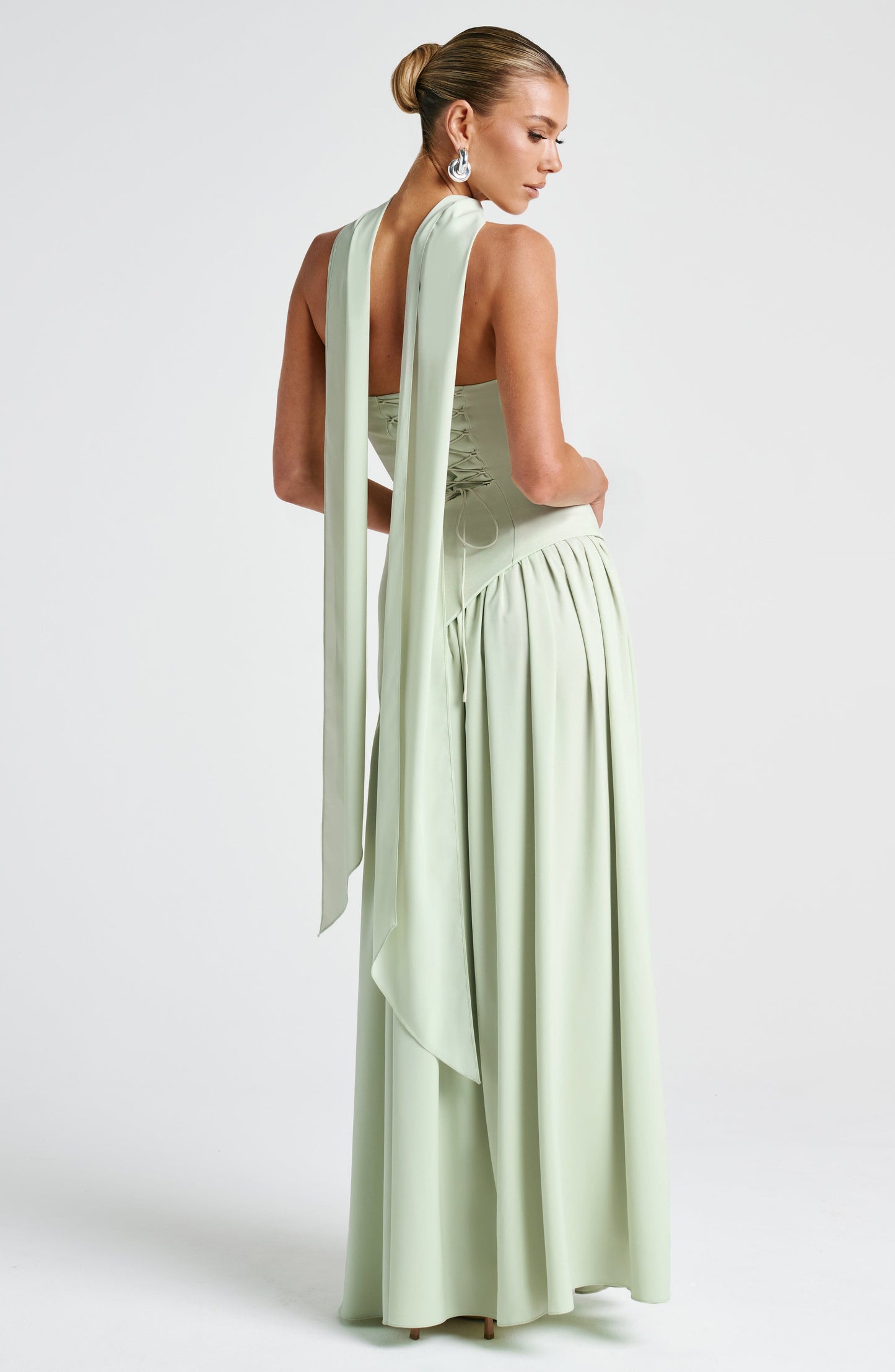 Mint strapless maxi dress with sculpted waist and chiffon scarf
